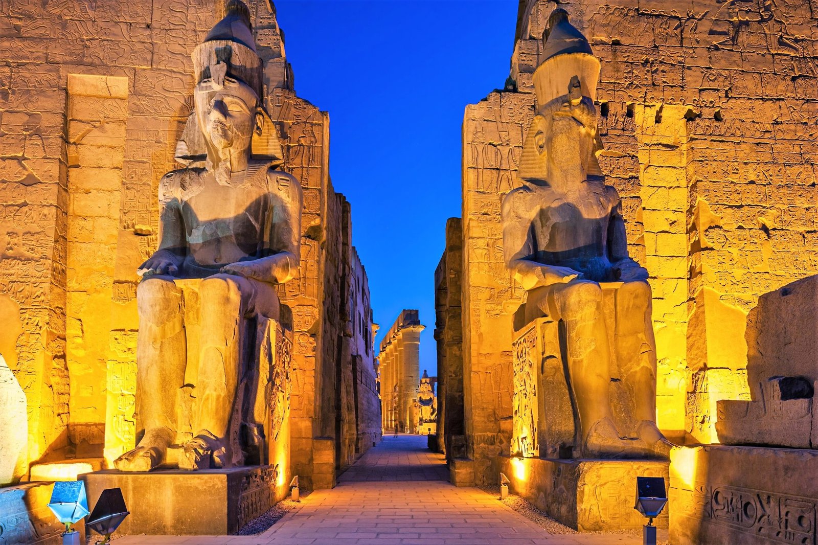 Illuminated statues of Ramses II at Luxor Temple