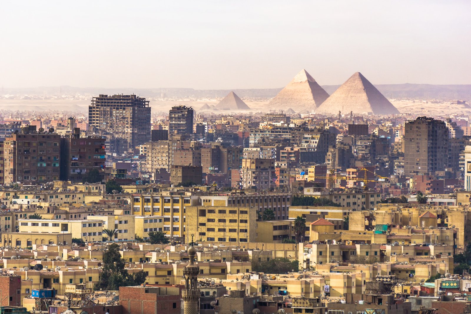 Panoramic view of modern Giza city in Egypt near historic pyramids