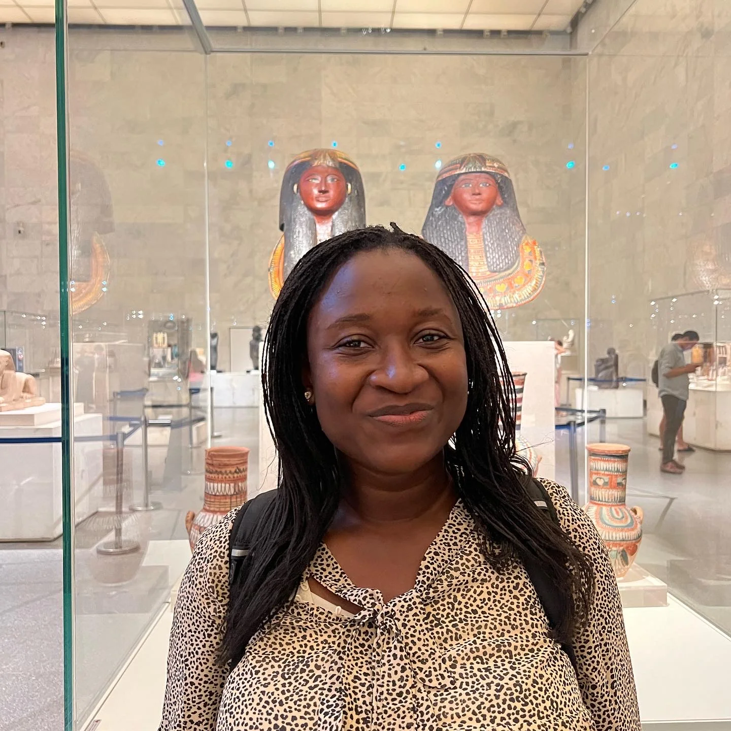 Visitor exploring an ancient Egyptian museum collection in Cairo