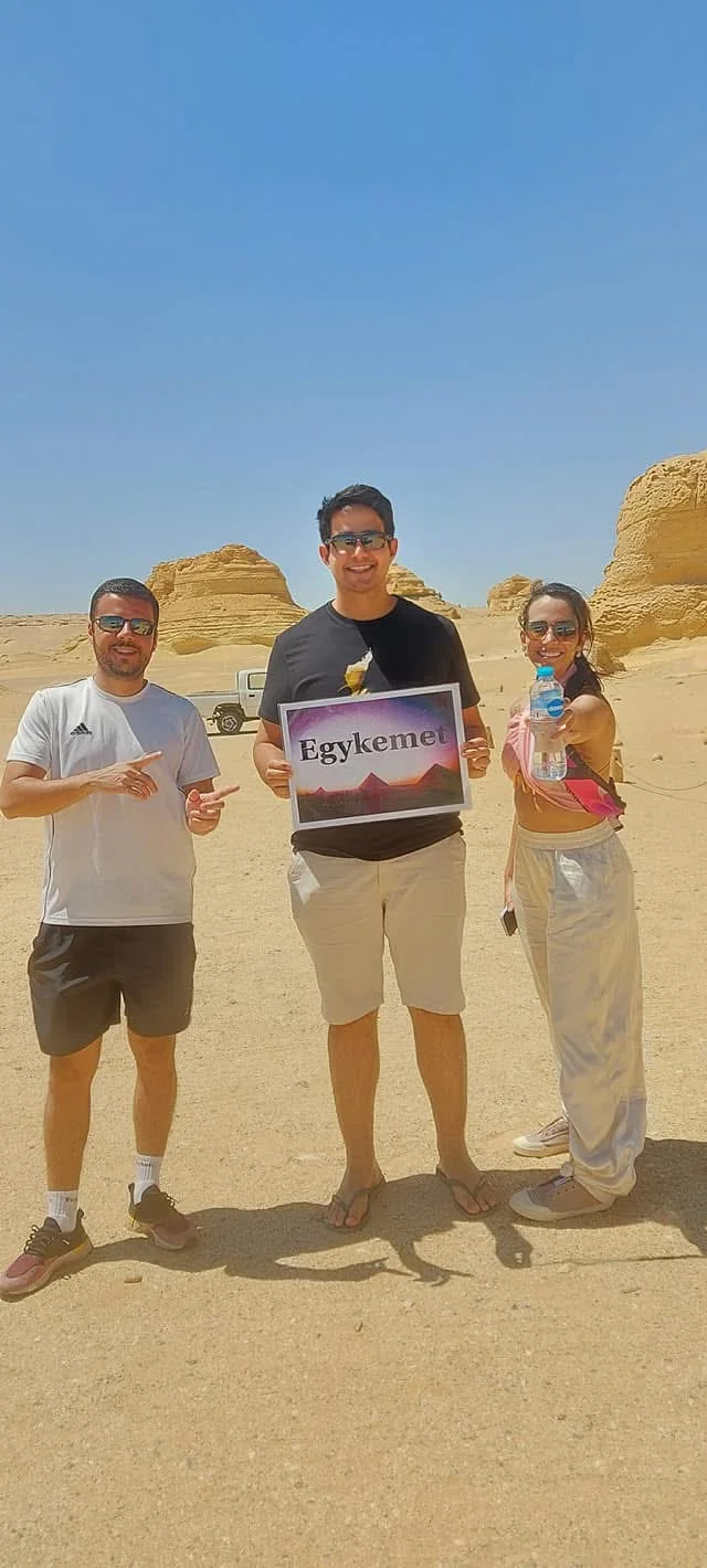 Egy Kemet Tours visitors beside the rock formations in Fayoum