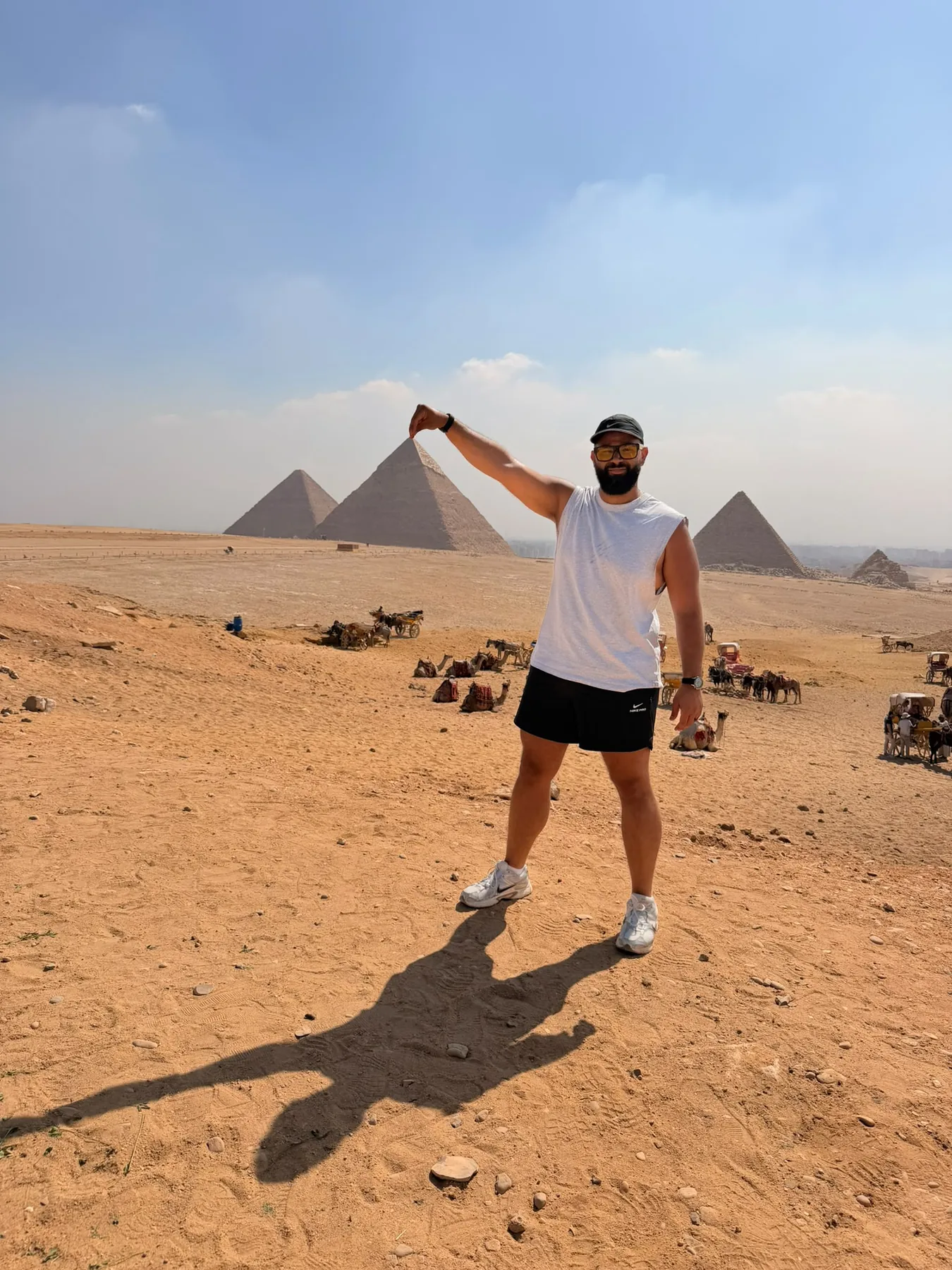 Traveler enjoying the panoramic view of the Giza Pyramids